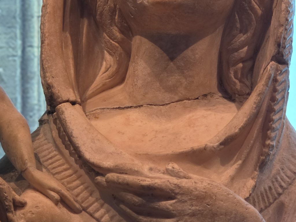 Detail of The Virgin alabaster with damage.